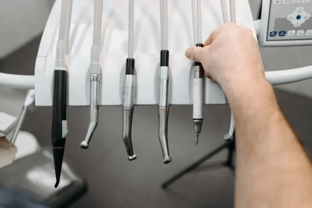 an array of dental handpieces on a dental unit